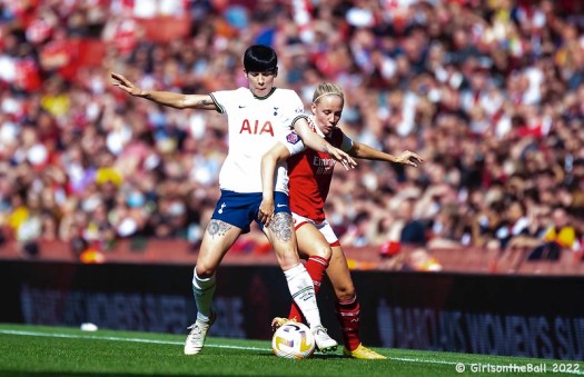 Ash Neville battles against Arsenal's Beth Mead
